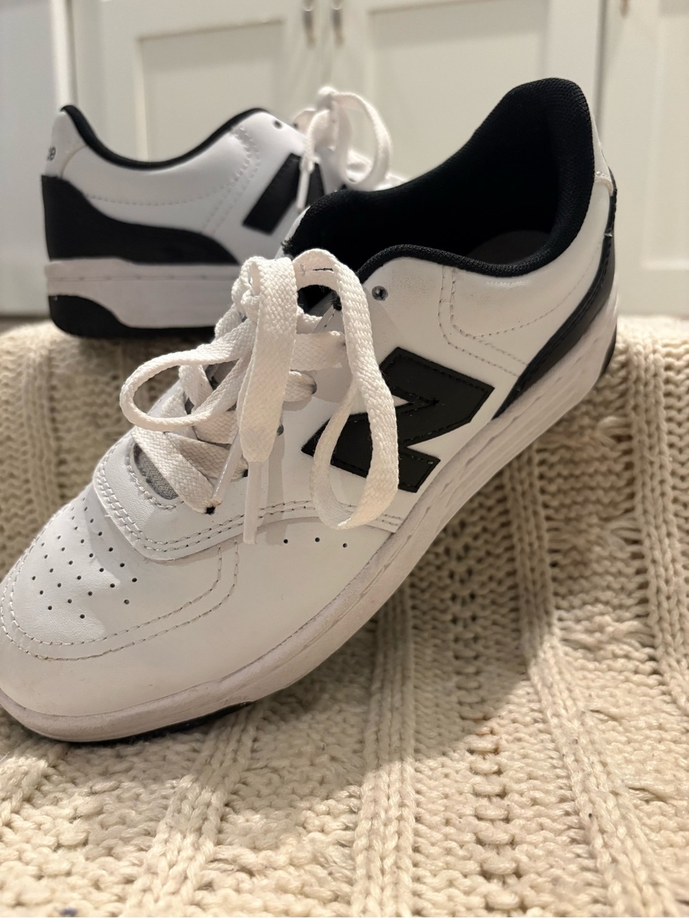 Boys New Balance White and Black Low-Top Sneakers